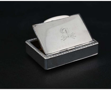 A George III silver snuff box, of rectangular form, with gadrooned border, the cover with armorial crest, the hinged cover op