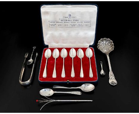 A single pair of George III Scottish silver sugar tongs, with shell bowls, sponsor's mark 'JF', Edinburgh c.1810, length 15cm