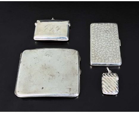 An Edwardian silver vesta case, of rectangular form, with hinged cover, and dual internal compartments, Arthur Cook, Birmingh