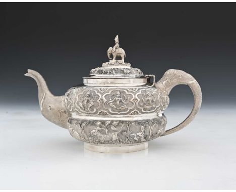 India.A late nineteenth or early twentieth-century Indian silver teapot, of globular form, with elephant spout and handle, th