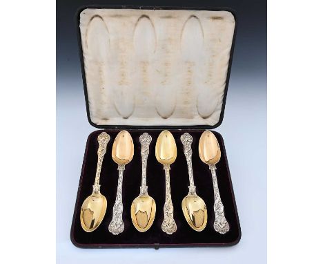 A cased set of six William IV silver-gilt Stag Hunt pattern tablespoons, each terminal with armorial crest of a tower, Willia