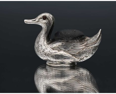 A George V novelty silver pin cushion, modelled in the form of a duck, the body with cushion pad and decorated to simulate fe