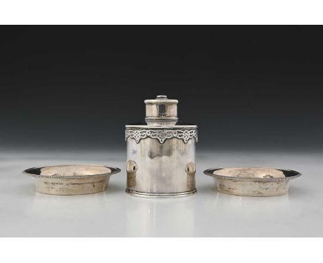 A George V Irish silver tea caddy, of cylindrical form, with applied cut-card type decoration depicting Celtic knots, the det