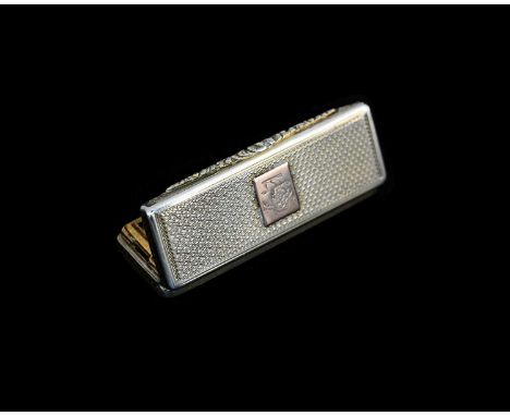 A George IV silver gilt vinaigrette, of slender rectangular form, the exterior with engine-turning and applied cartouche in g