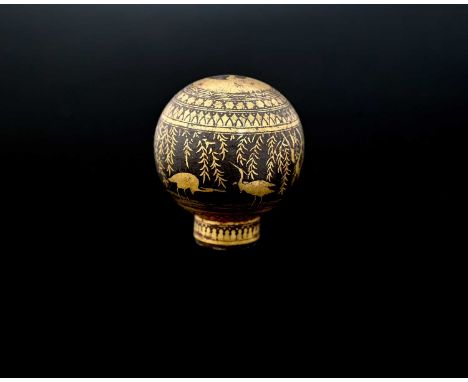 A late nineteenth-century Aesthetic style gold-coloured Damascened metal parasol finial, decorated with crane birds, trees, a