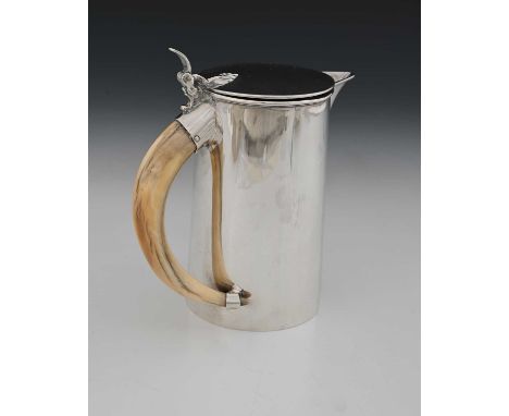 A Victorian silver tankard or lidded pot, of cylindrical form, with spout and hinged cover, ensuite with a boar's tusk handle