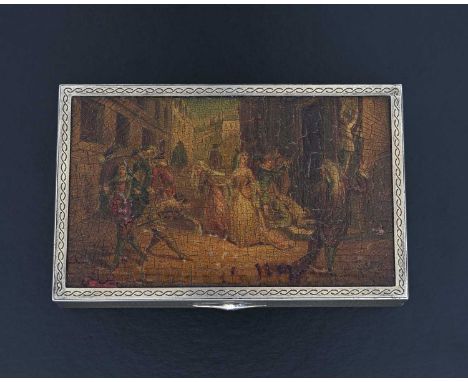 An early twentieth-century French silver gilt box, of rectangular form, the exterior decorated with engine-turning, inset wit