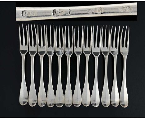 Scotland.A set of twelve George I Scottish silver Hanoverian pattern three prong table forks, each initialled, 'Ct' or simila