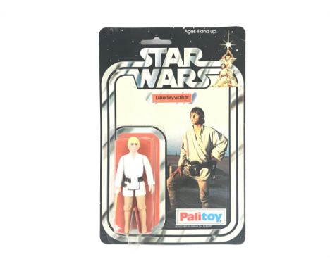 A Vintage Star Wars Palitoy 1977 Carded Luke Skywalker. One of the first 12 Figures released.