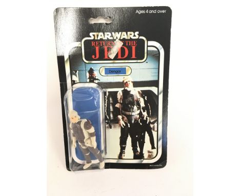 A Vintage Star Wars Return Of The Jedi Dengar Figure. Blister has Dents. Possibly re- Glued.