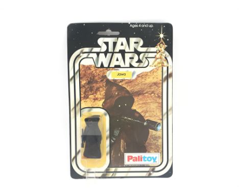 A Vintage Star Wars Palitoy 1977 Carded Jawa. One of the first 12 Figures released.