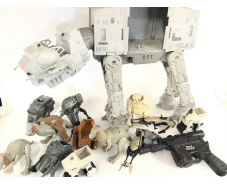 A Collection of Vintage Star Wars Vehicles and a Han Solo Blaster. Good for Spare Parts Etc.