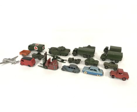 Collection of various vintage playworn Dinky vehicles.