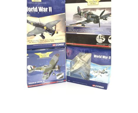 4 X Boxed Corgi Aircraft including a Junkers JU-87 Stuka. A Hawker Typhoon. A Gloster Sea Gladiator and a Junkers JU 87B-2. A