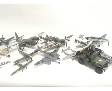 A Collection of Die-cast Aircraft and Vehicles in Various States and 4 Model Kits.(2)