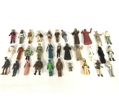 Collection of various vintage Star Wars figures including bendums