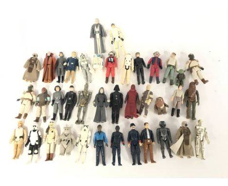 A Collection Vintage Star Wars Figures including Luke Skywalker (Storm Trooper) Ewoks. Stormtrooper.