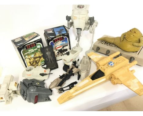 A Collection of Vintage Star Wars Toys Including a Boxed Ewok Catapult and Tri-Pod Laser Cannon.