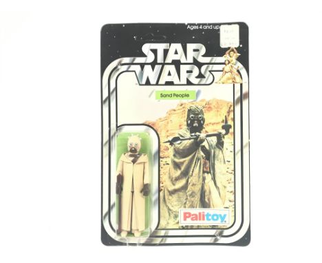A Vintage Star Wars Palitoy 1977 Carded Sand People. One of the first 12 Figures released. Un punched.