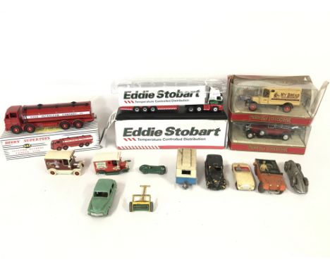 Collection of playworn vehicles including vintage dinky.