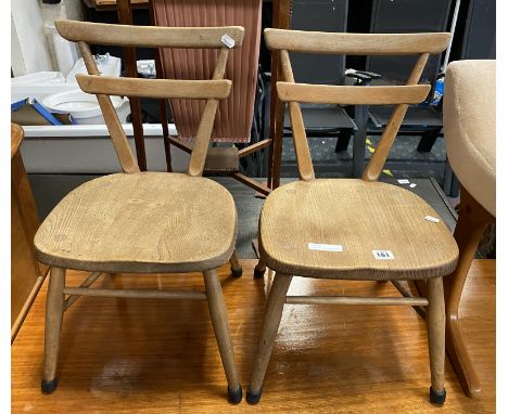 PAIR OF ERCOL YELLOW DOT STACKING CHILD'S CHAIRS