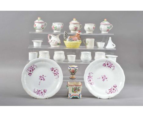including two faience plates, both 21cm diameter, a small faience twin handled vessel, cracked restored, one handle missing, 