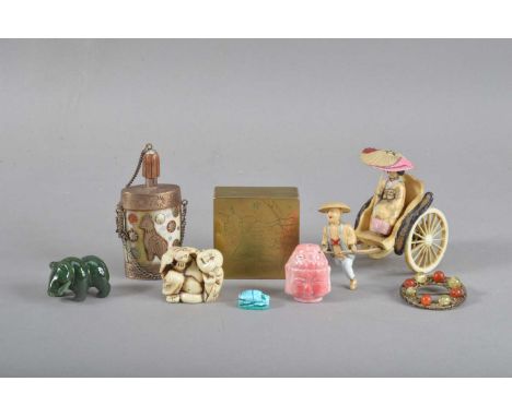 comprising a small brass box, with puppies on the cover, character mark to the underside 2.5cm H x 5cm x 5cm, a modern bone a