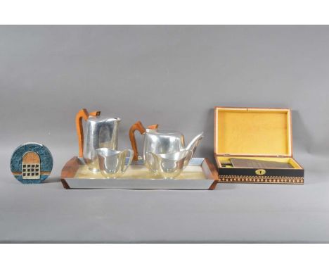 comprising a five piece Piquot ware tea and coffee set, stainless steel and wood, comprising a tray 47cm x 30.5cm, coffee pot