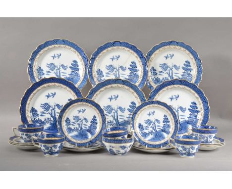 numbered A8025, all with blue and white design and heightened gilt, comprising six dinner plates, six side plates, five cups 