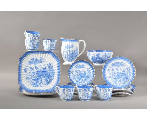 Willow pattern design with gilt edges, comprising six cups and saucers, six side plates, a sugar bowl, milk jug and two squar