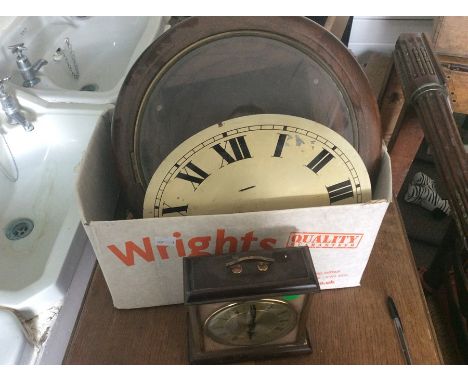 A 19th Century wall clock, in pieces, AF, together with a small quartz mantle clock, (one box)