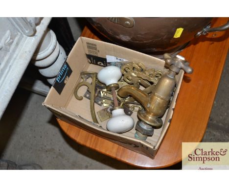 A vintage brass bath tap; door handle; hooks, hinges etc. 