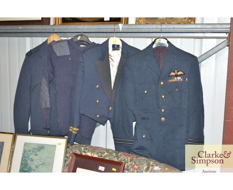 A collection of various vintage RAF uniforms