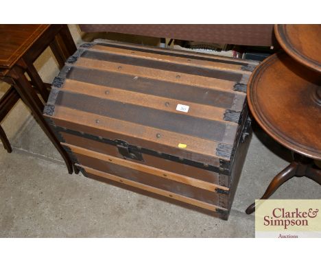 A Victorian domed and battened travelling trunk