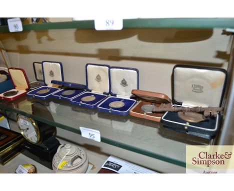 A collection of vintage military sporting medals, some silver etc