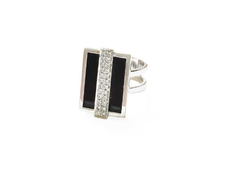An Art Deco Style Onyx and Diamond Ring, the rectangular onyx plaque overlaid with two rows of round brilliant cut diamonds, 