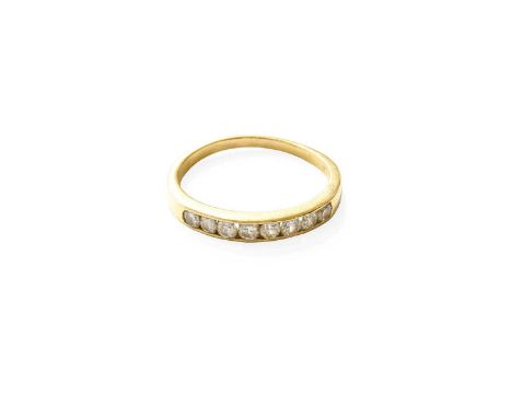 An 18 Carat Gold Diamond Half Hoop Ring, the round brilliant cut diamonds in a yellow channel setting, to a plain polished sh