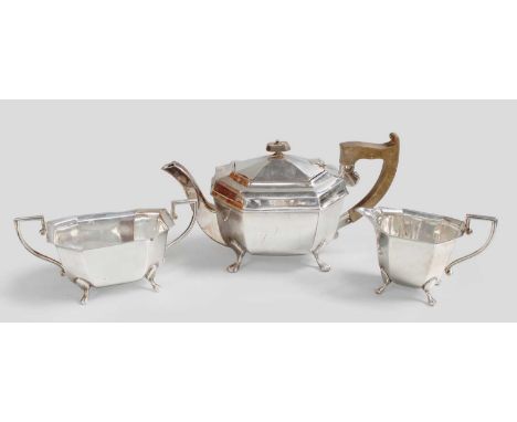 A Three-Piece George VI Silver Tea-Service, by Viners Ltd., Sheffield, 1938, each piece elongated octagonal and on four taper