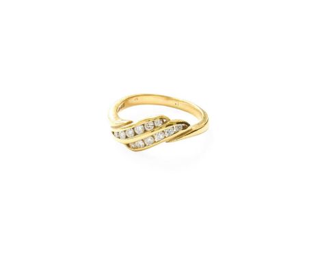 An 18 Carat Gold Diamond Ring, comprising of two diagonal rows of round brilliant cut diamonds, in yellow tension settings, t