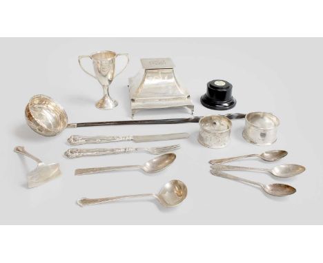 A Collection of Assorted Silver, including an inkwell; a small trophy-cup, on ebonised stand; two differing napkin-rings and 