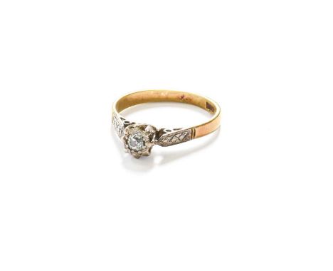 A Diamond Solitaire Ring, the old cut diamond in a white illusion setting, to a tapered shoulder yellow plain polished shank,