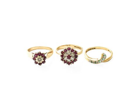 A 9 Carat Gold Emerald Ring, finger size K1/2; and Two 9 Carat Gold Ruby and Diamond Cluster Rings, finger sizes J and K1/2Gr