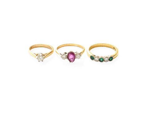 An 18 Carat Gold Emerald and Diamond Five Stone Ring, three round cut emeralds alternate with two round brilliant cut diamond