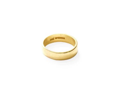 An 18 Carat Gold Band Ring, finger size NGross weight 5.6 grams.