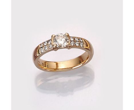 18 kt Gold Ring mit Brillanten,   GG 750/000,1 Brillant ca. 0.59 ct Weiß/si2, 12 Brillantenzus. ca. 0.22 ct Weiß/si, total ca