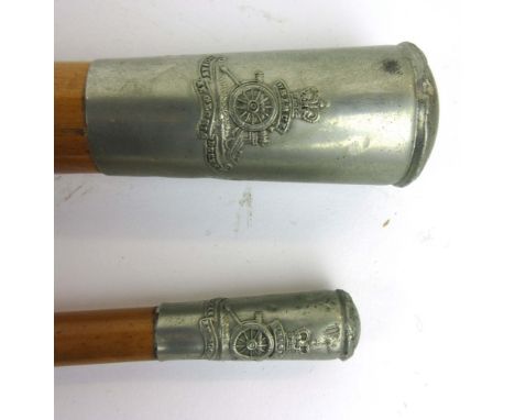 A Royal Artillery walking stick with emblem to top and etched W02 MJ Lynch, together with a matching Royal Artillery swagger 