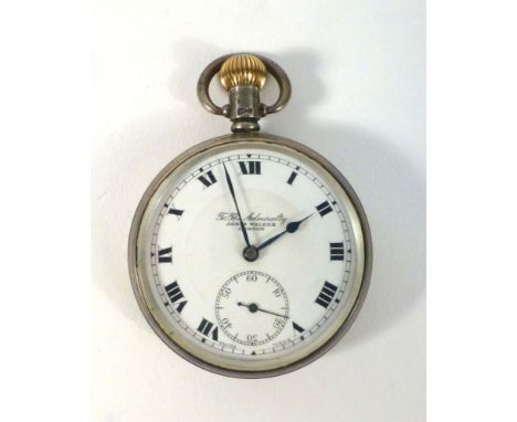 A silver cased open face pocket watch by James Walker, the white enamel dial with black Roman numerals within an engine turne