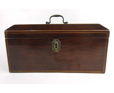A late 18th century mahogany and boxwood strung tea caddy, the canted top opening to reveal three lidded compartments, h. 15 