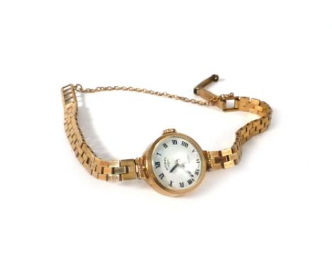 A 9ct yellow gold cased ladies Incabloc wristwatch by Rotary, the circular white dial with black Roman numerals on an articul