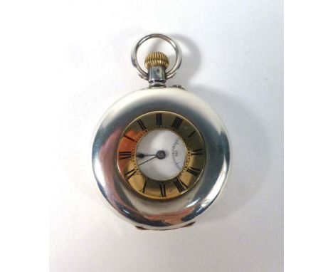 A silver cased half hunter pocket watch, the white enamel dial with black Roman numerals and second hand section within a pla